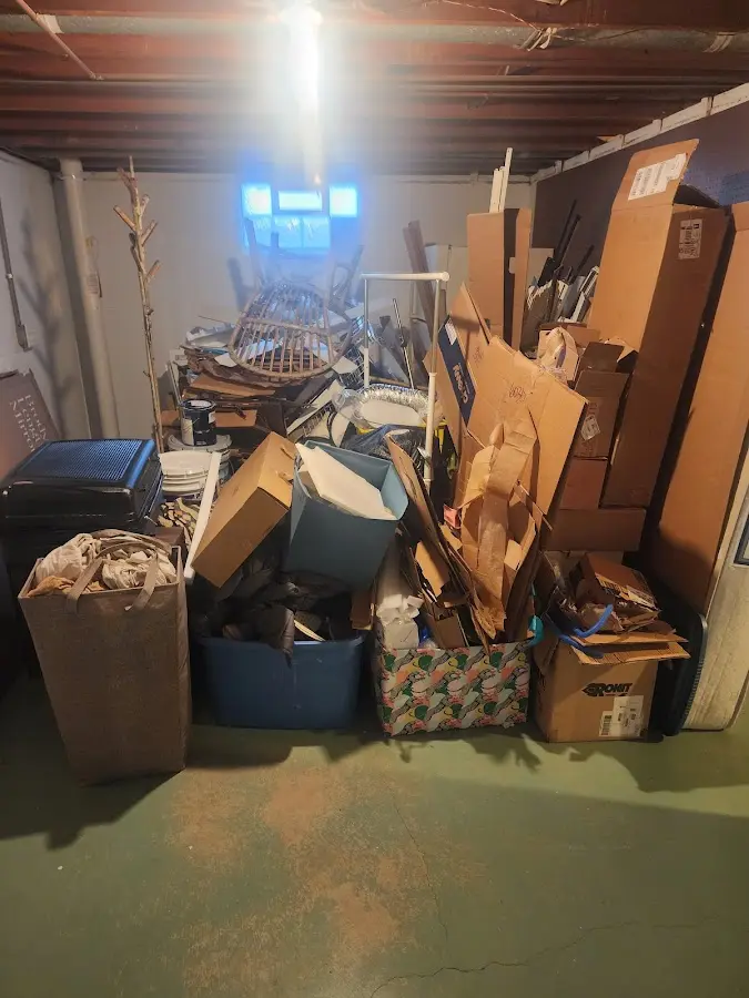 Roll-off dumpster container at job site for Yard Waste Dumpster Rental in Hideaway